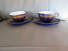 2 Antique Sarreguemines Cups and Saucer Gold Decor on Blue Background