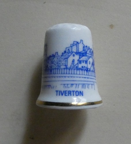 Dé coudre porcelaine - à,