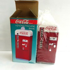 COCA COLA® TIRELIRE DISTRIBUTEUR FONTE NEUVE + BOITE 1995 VENDING MACHINE BANK
