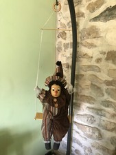 CLOWN SUR BALANCOIRE TETE EN