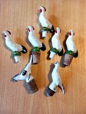 7 Anciens bouchons de bouteille bec verseur en porcelaine