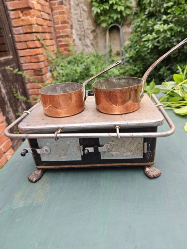 Jouet ancien cuisiniere en - -,