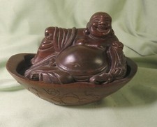 Bouddha rieur allongé brule encens  en bois sculpté
