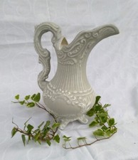 Aiguière patinée gris