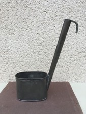 Ancienne louche à eau en