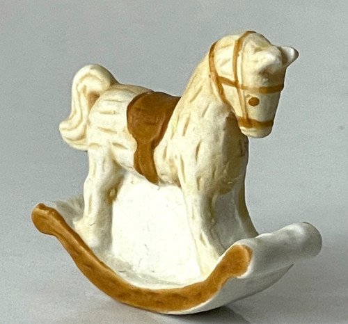 Fève mat cheval - à, bascule