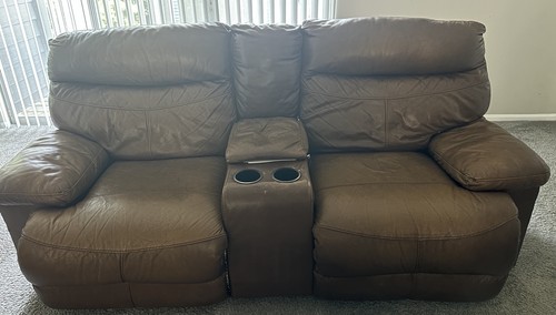 Brown leather loveseat and - leather,