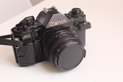 Joli canon objectif - a1,