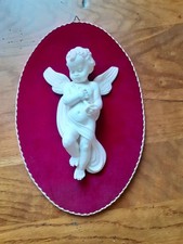 Ange mural musicien en relief