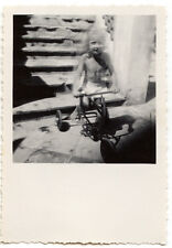 Child on his tricycle - old amateur photo year. 1930