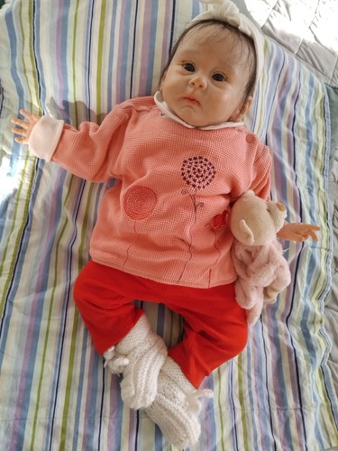 Souriante bébé reborn nina - souriante,