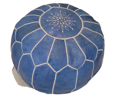 pouffe en cuire , repose pieds