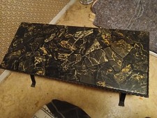 Table basse plateau en marbre couleur noire degradee avec support en fer forge