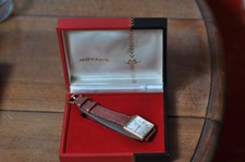 montre MOVADO automatique or 18k dans son ecrin, fonctionne parfaitement