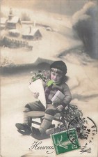 CP CHILD HAT WITH MISTLETOE GIFT ON SLEDGE