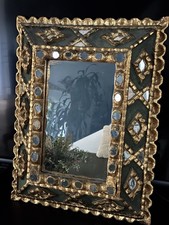 Vieux miroir en bois doré