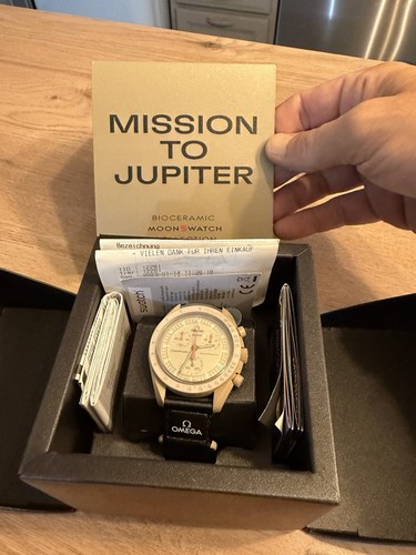 Swatch omega - x,