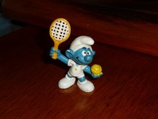 schtroumpf tennisman raquette