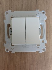 Interrupteur double poussoir