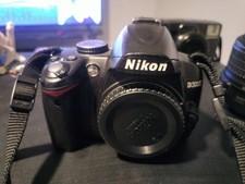 Nikon D3000 DSLR With Lens And