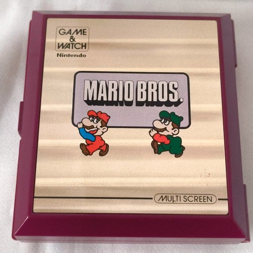 Usé nintendo game - &, watch