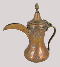 Théière en cuivre à long