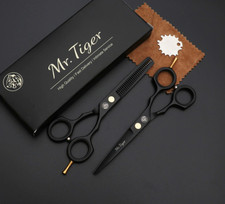 2 paires de ciseaux de