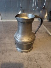 tin pitcher