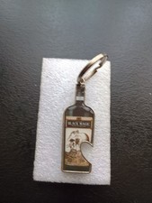 1 porte clés Décapsuleur