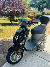 genuine buddy 125cc scooter, black, topper, used good, motor scooter, 125cc