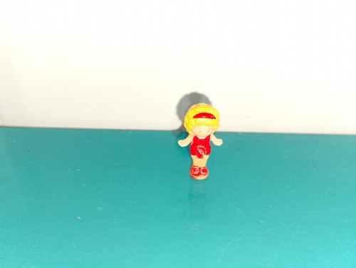Polly pocket figurine doll