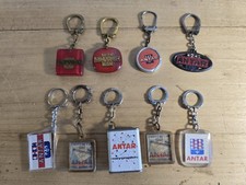 lot 9 antique holographic antar bourbon keychains