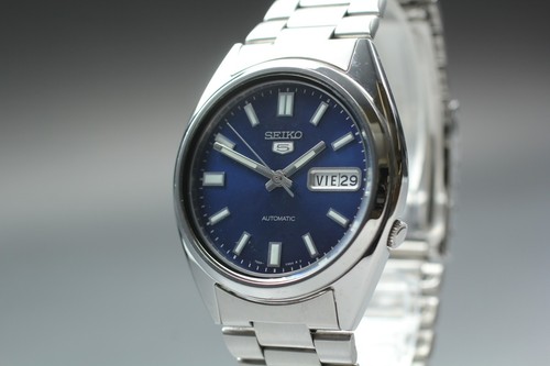 Presque comme neuve montre - comme, neuve]
