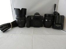 Olympus EVOLT E-3 10.1MP Shutter count is only 91. ( Ninety-one) With 2 lens.