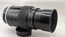 Objectif Nikon Micro-Nikkor 4 / 105mm pré-AI avec bouchons avant & arrière