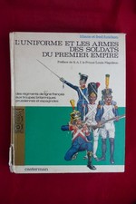 L’uniforme et les armes des