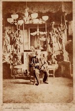 Victor Hugo in the red living room of Hauteville-House. Rare photograph. 1878.