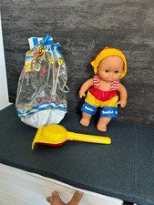 Poupée BABISOL FURGA Qui Bronze Au Soleil Avec Sac De Plage Et 2 Petites Pelles