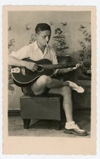 PHOTO photograph circa 1950, a musician folk guitar style fashion fashion