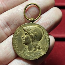 #117-T2 ~ Médaille - Insigne