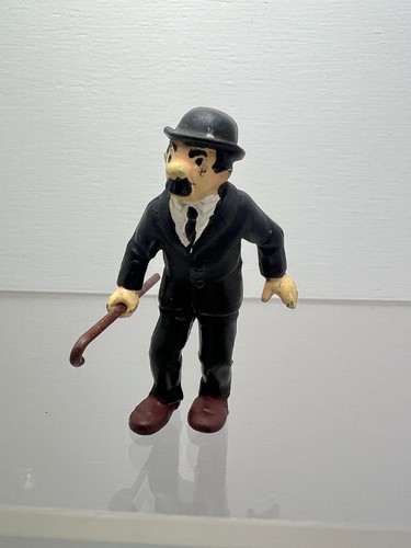 Figurine dupont avec canne