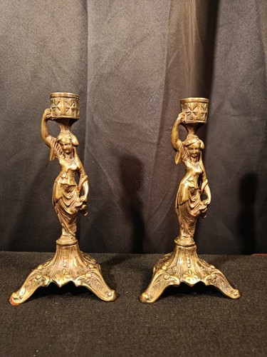 Paire bougeoirs cariatides