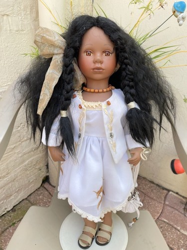 Poupee porcelaine metisse - en,