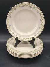 7 assiettes plates Longwy