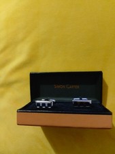 Boutons de manchette,  Simon