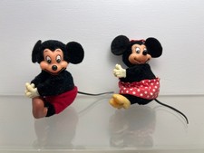 Figurines vintage pince mickey