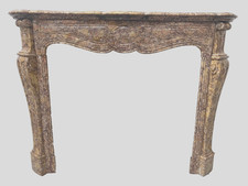 Cheminée de style Louis XV Model Pompadour Marbre brèche moucheté  . XX siècle .