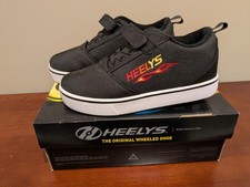 Original Heelys Pro 20 X2 Wheeled Shoes Kids Youth Size 5 Black Red Yellow Boxed