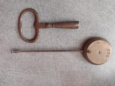 balancier pendule ancien + clé Horloge