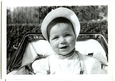 Baby child in pram - old photo year. 1940